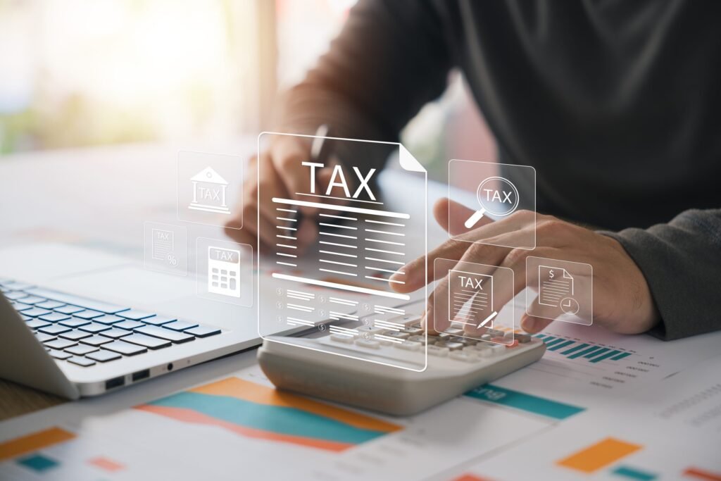 corporate individual tax payment concept businessman using computer filling out corporate personal income tax return vat property tax business scaled